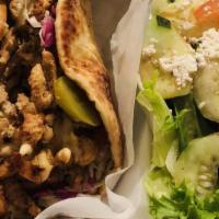 Chicken Shawarma Wrap · Wraps are served with choice of mediterranean salad or pita fries.