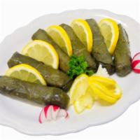 Stuffed Grape Leaves · Grape leaves stuffed with rice, fried onions and spices.
