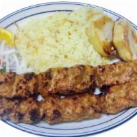 Chicken Lula Kabob · Ground chicken with spices broiled on skewers over an open flame.
