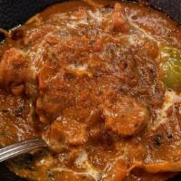 Lazeez Murgh Tikka Masala · Chicken Tikka in flavorful tangy gravy.