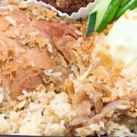 Biryani Chicken · Basmati rice cooked with aromatic spices and lightly spiced chicken with a boiled egg.