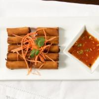 10 Pieces Crispy Pork Roll · Golden fried rice paper crepe rolls stuffed with ground pork. Served with sweet and sour sau...