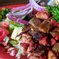 Lamb/Steak Gyros · Thin Marinated slices of Lamb/Steak topped with fresh Lettuce, Onion, Tomatoes, and Tzatziki...