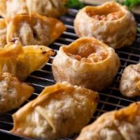 Vegetable Dumplings · Choice of Fried or Steamed dumplings.