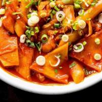 Tteokbokki (Spicy Rice Cakes) · Soft rice cake and vegetables in sweet & spicy sauce.