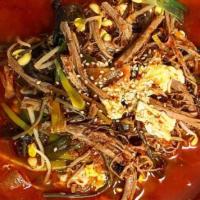 Yukgaejang (Spicy Beef Soup) · Shredded beef, bean sprouts, fiddlehead fern, egg & glass noodle in spicy broth.