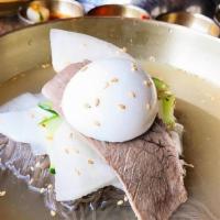 Mul Naengmyeon 물냉면 · Buckwheat noodles in cold beef broth, thin slices of beef, hard boiled egg,
Asian pear & veg...