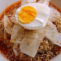 Bibim Naengmyeon 비빔냉면 · Cold buckwheat noodles in sweet chili paste thin slices of beef, hard boiled egg, asian pear...