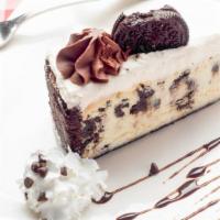 Oreo Cheesecake · Popular. Sour cream, cream cheese and chunks of oreo cookies are baked in a chocolate cookie...