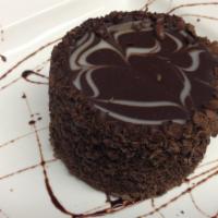 Chocolate Truffle Cheesecake · Creamy dark chocolate and luscious cheesecake perfectly blended atop a chocolate cookie crus...