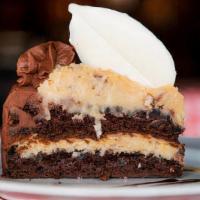 German Chocolate Cake · Popular. Two layers of moist chocolate cake filled and topped with a blend of butter, cream,...