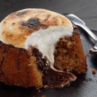 Campfire S'Mores Lava Cake · Chocolate ganache inside this giant graham cracker cake into a sumptuous molten filling. The...