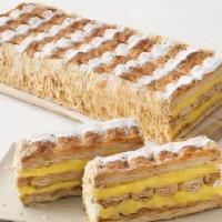 Napoleon · Crisp layers of puff pastry filled with pastry cream and decorated with powdered sugar.