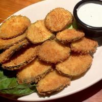 Crispy Fried Garlic-Pepper Zucchini · Fresh zucchini slices breaded in panko bread crumbs, served with our house-made cucumber dip.