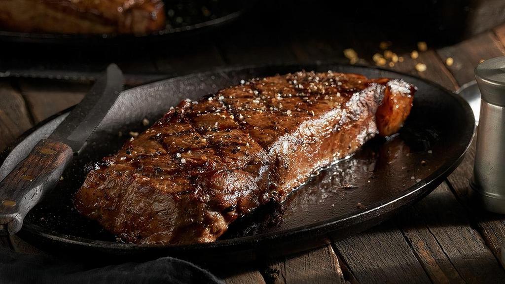 New York Strip Center-Cut · Hearty and robust, a perfect balance of flavor, texture, and tenderness.