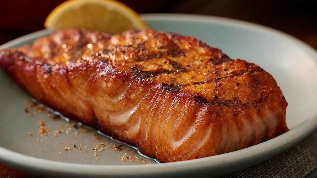 Grilled Fresh Salmon · Signature item. 8oz filet of fresh salmon, hand-cut, simply seasoned and grilled over an open flame.