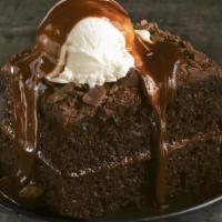 Big Mountain Chocolate Fudge Cake · Topped with vanilla ice cream and hot fudge.