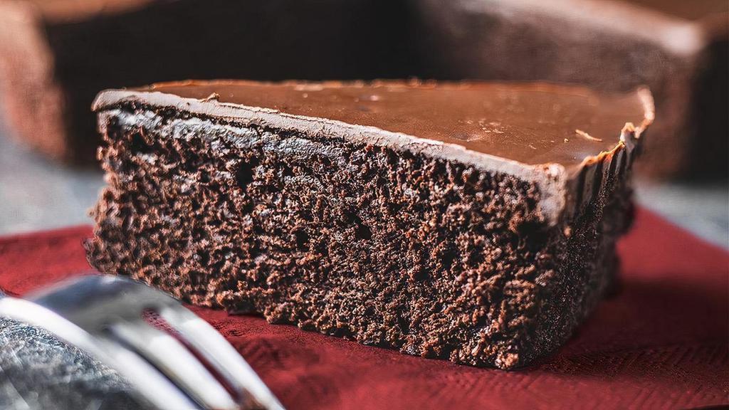 Chocolate Flourless Torte · A decadent flourless blend of four chocolates topped with a ganache. A timeless recipe that is naturally gluten-free.
