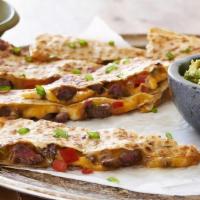 Steak Quesadilla · Grilled steak, fresh pico de gallo, Cheddar and Jack cheeses, served with guacamole and sour...