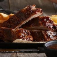 Bbq Pork Ribs - Full Rack  · Our fall-off-the-bone ribs marinated, seasoned with spices, slow roasted, and finished over ...