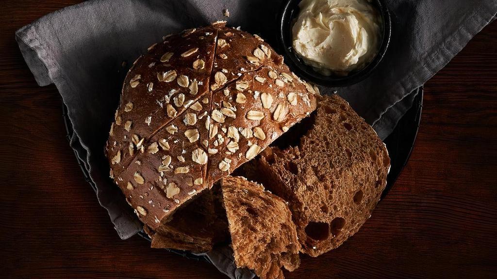 Warm Molasses Bread · While every Entrée comes with our Signature Molasses Bread, it's so good you might need more!