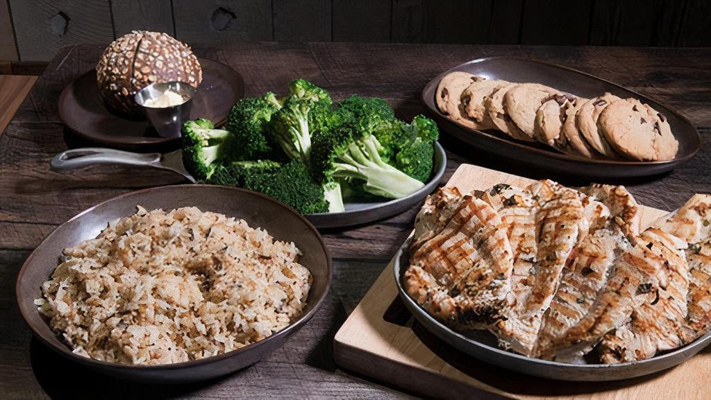 Chicken Family Meal · (8) Fire-Grilled Chicken Breasts, Home-Style Mashed Potatoes or Rice, Fresh Broccoli with Garlic Butter, 8 Chocolate Chip Cookies