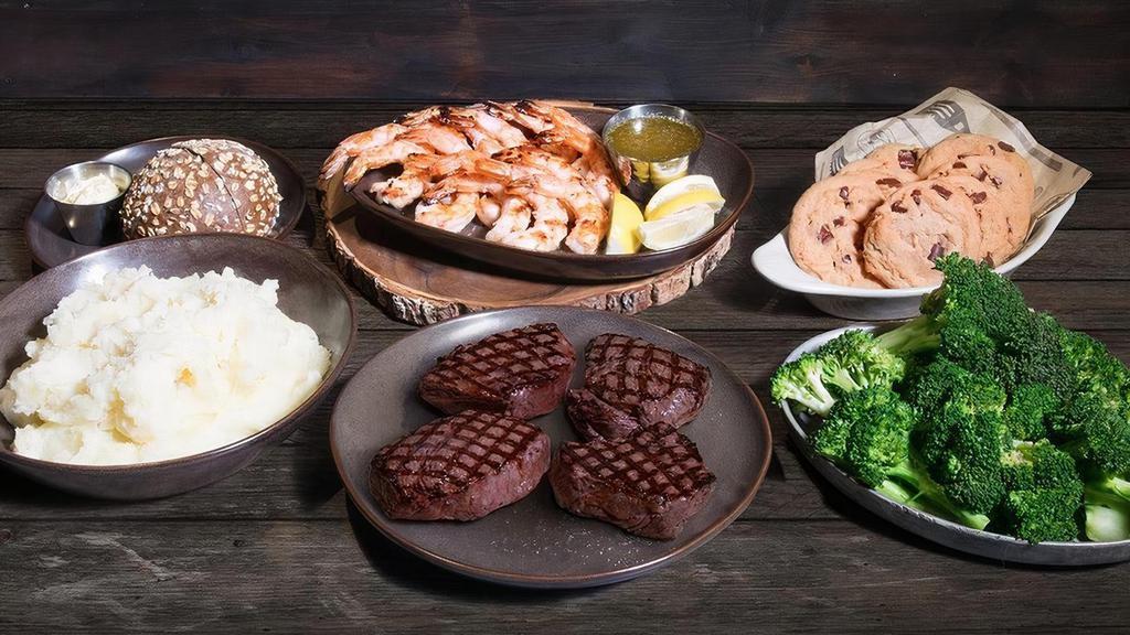 Surf & Turf Family Meal · (4) 8oz Top Sirloin Center-Cut, Fire-Grilled Jumbo Shrimp, Home-Style Mashed Potatoes or Rice, Fresh Broccoli with Garlic Butter, 8 Chocolate Chip Cookies.. *All steaks cooked to the same temperature. *Upgrade to Filet Mignon available