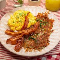 Farmhouse Breakfast · 2 eggs, hash browns, bacon or sausage, toast