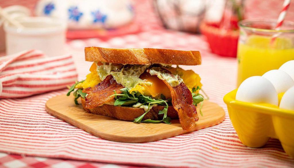 Classic Bacon Sourdough Sandwich  · sourdough, bacon, cheddar, egg, lemon herb aioli, arugula