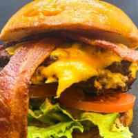 Double Bacon Cheeseburger · 2 Angus beef patties, thousand island, lettuce tomato, American cheese, grilled onions and a...