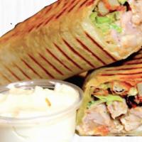 Golden Wrap  · Stuffed Wrap with Chicken Shawarma, and Sauce.