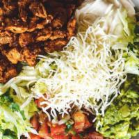 Protein Bowl · Rice, black beans, lettuce, guacamole, pico de gallo, sour cream, and cheese.