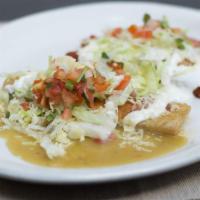 Enchilada Plate · Green or red salsa. Two enchiladas (cheese or chicken) with sour cream, lettuce, and cheese....