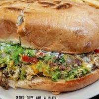 Machaca · Shredded beef with bell peppers, onions, eggs, beans, lettuce, cheese, salsa fresca and guac...