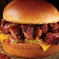 Pork Burnt Ends Sandwich · Double smoked chopped pork burnt ends of brisket with cheese & pickles, served on at toasted...
