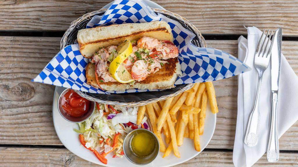 Lobster Roll · Chilled seasoned lobster, pier sauces, grilled split top bun, lemon, French fries,