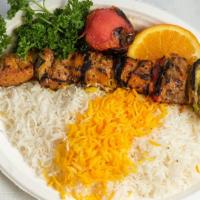 Shish Kabob · Charbroiled, juicy large chunks of filet mignon, skewered with onions, tomatoes and green pe...