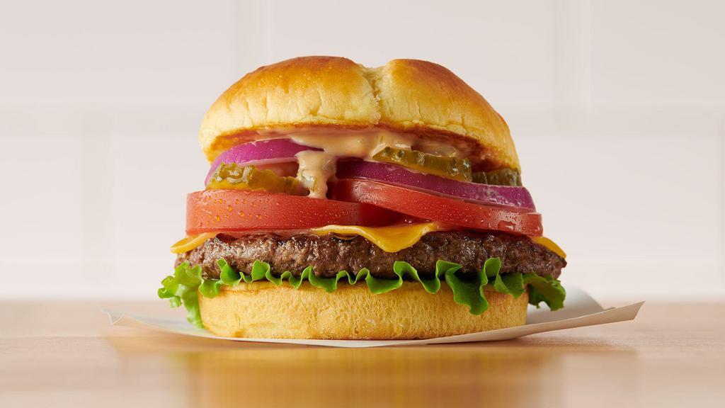 Coco'S Famous Hamburger With Cheese · Taste where it all began – 6 oz. of fresh beef topped with cheddar cheese, lettuce, tomatoes, red onions, pickles, and Coco’s special sauce. Served with choice of fries or a fresh garden salad.