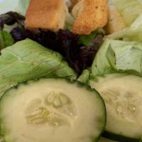 Side Salad · A fresh and light blend of mixed greens, grape tomatoes, cucumbers, and crisp croutons, with...