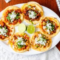Street Tacos · meat, onions, cilantro
