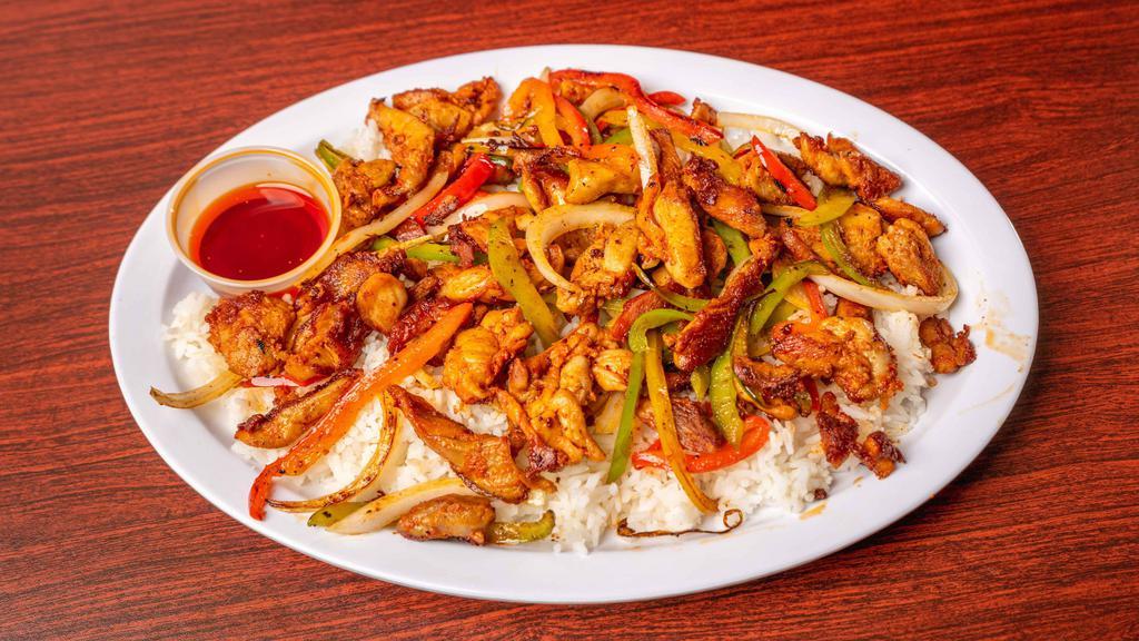 Pollo Adobado · Marinated chicken with white rice, bell peppers and grilled onions