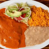Chile Relleno · Stuffed pepper covered in special sauce, with rice and beans