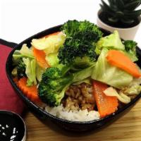 Veggie Teriyaki Bowl · Freshly Cooked Broccoli, Cabbage and Carrot with steamed Jasmine Rice. Topped Signature Teri...