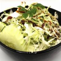 Cabbage Salad Side · Crisp fresh shredded cabbages with cucumber and cilantro. With sweet tangy sesame dressing