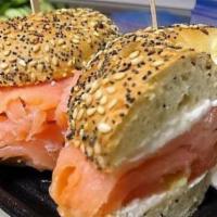 Lox Salmon · Lox is a fillet of brined, smoked salmon; cream cheese, alfalfa, red onions, guacamole, cucu...