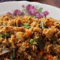 Vegetable Biryani · Basmati rice cooked with fresh vegetables.