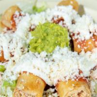 Pollo Flautas · Shredded chicken.