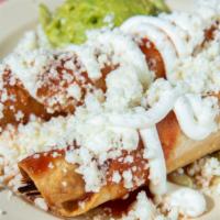 Pollo Taquitos · Shredded chicken.