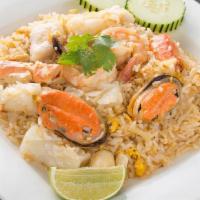 Seafood Fried Rice · Pan-fried rice with shrimps, squid, mussels, fish, crab, scallops, egg and onions.