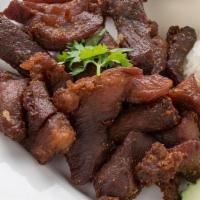 Pork Jerky · Deep-Fried pork with thai  spicy sauce on the side.